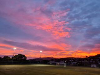 Empty football pitch at sunrise