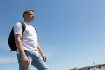 Young man on the embankment