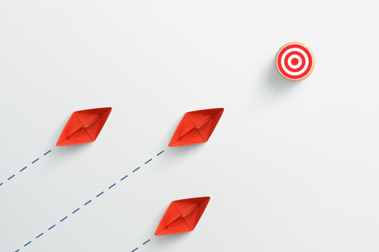 Target concept with group of red paper ships on white background. target icon