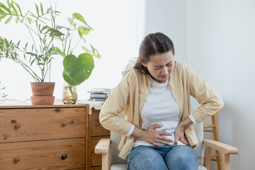 woman hand touching abdomen having stomach ache, female eating food poisoning causes flatulence,...