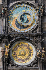 Medieval timepiece on the facade of city hall displaying the twelve apostles as the clock strikes....