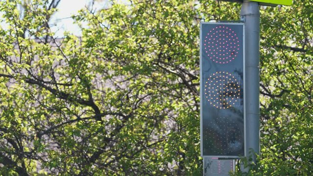Red Traffic Light swich to green light. Trafic safe. Cars and pedestrians save. Pedestrian and crossroad concept