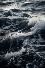 Fototapeta premium Dark black and white close-up photo of an ocean wave captures the raw power and beauty of nature, contrasting foamy white water with deep black hues. Minimalist monochrome sea landscape. Generative AI