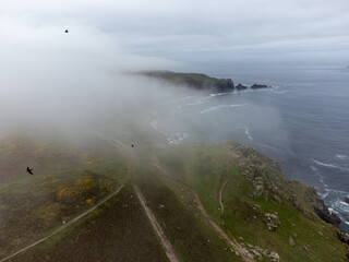mist over landsend cornwall England uk aerial drone 