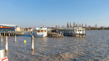 Neusiedl, Podersdorf am See, Burgenland, Austria - March 2023: View of the lighthouse, wooden pier