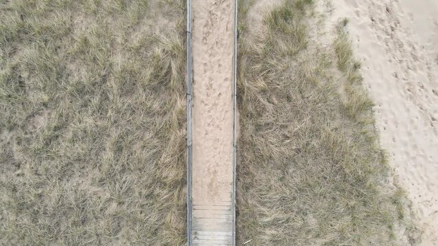 Sand blocking the boardwalk after heavy storms.