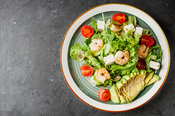 delicious fresh salad with shrimp, blue cheese and avocado