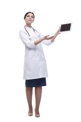 in full growth. female doctor with a digital tablet.