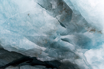 deep blue ice structure in a swiss ice cave in the Valais Alps
