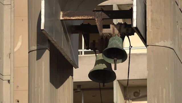 Symbolic shot of church bells and bullet holes in Varosha, where Greek Cypriots had to flee when Turkey invaded Northern Cyprus in 1974