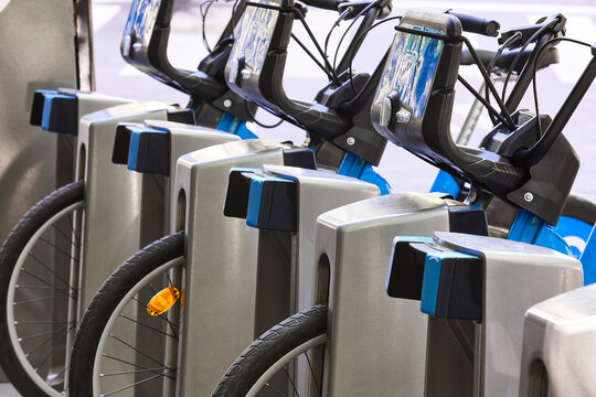 Charging urban electric battery bikes in the city. Sustainable mobility
