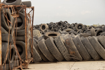 used rubber tyres on a scrap land
