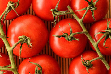 tomatoes on branch the food background
