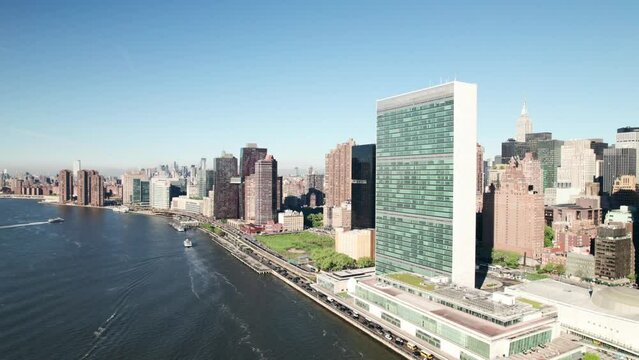 UN Building in Midtown Manhattan. 4K drone shot. Clear spring day.