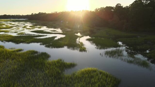 Drone Shot of the Georgia Intercoastal Marsh Land at Sunset Near Pinpoint Museum in Savannah, Georgia.
