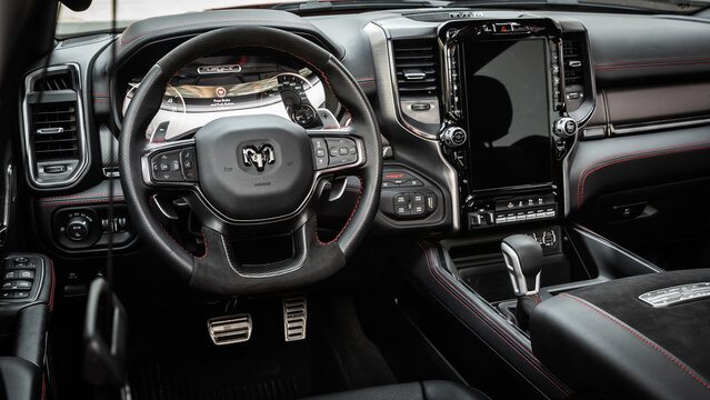 Novosibirsk, Russia - April  25, 2023: Dodge Ram Trx,  steering wheel, shift lever and dashboard, climate control, speedometer, display.
