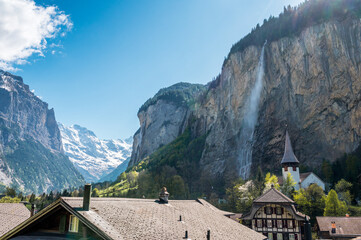 view of Staubbachfall in Lauterbrunnen on a beautiful sunny spring day in the Bernese Alps