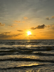 Evening sea with a beautiful golden sunset