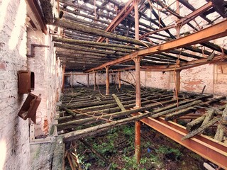 Fototapeta na wymiar Interior of a burnt warehouse with multiple storeys