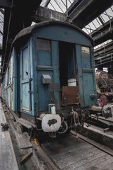 Fototapeta na wymiar Old warehouse with abandoned trains somewhere in Belgium, Urbex.