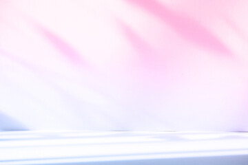 Abstract pink color gradient studio background for product presentation. Empty room with shadows of window and flowers and palm leaves . 3d room with copy space. Summer concert. Blurred backdrop.