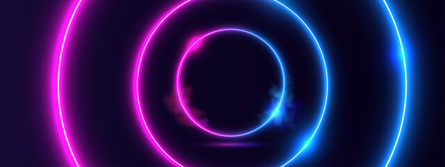 Glowing neon circle light on black background