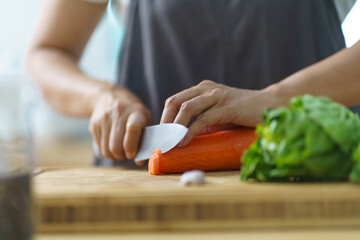 Prepare food  woman is preparing vegetable salad in the kitchen Healthy Food Healthy Cooking