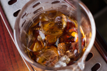 Bar and bartenders making coctails, closeup details