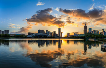 Panoramic view of city skyline and modern buildings at sunset in Ningbo, Zhejiang Province, China.