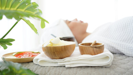 Fototapeta na wymiar Close up spa massage sugar scrub. Spa beauty massage healthy wellness. Spa Thai therapy treatment aromatherapy for body woman. Young woman enjoying and relax massage in spa salon