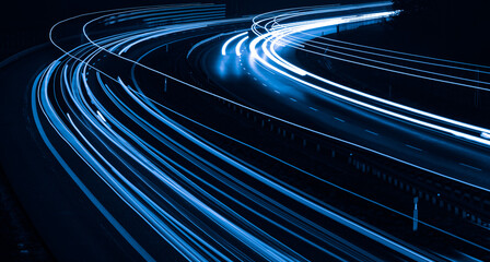 blue car lights at night. long exposure - obrazy, fototapety, plakaty