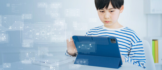 タブレットで勉強する少年とテクノロジー　eラーニング　エドテック