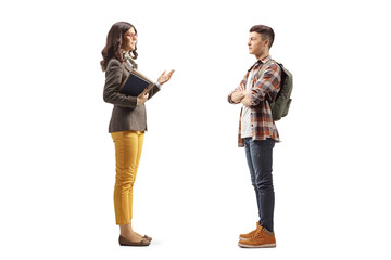 Fototapeta premium Female teacher talking to a male teenage student