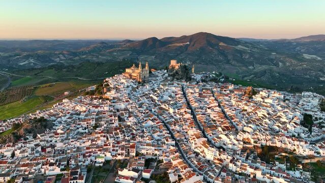 aerial view of Castillo de Olvera Towering On White Village In Olvera, Province of Cadiz, Spain