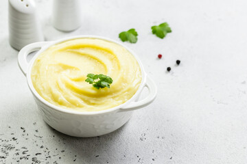 White bean and cauliflower mash in a bowl. Top view, copy space, flat lay.