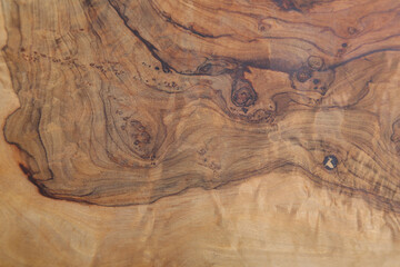 Naklejka premium wood texture background (olive wooden cutting board) tree, rings, lines, curves