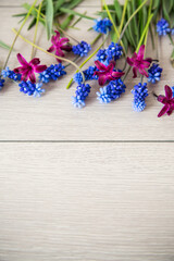 beautiful bouquet of spring flowers on a wooden table