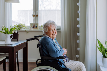 Portrait of senior woman on a wheelchair.