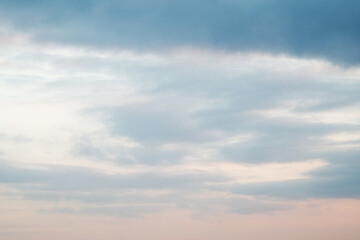 Fototapeta na wymiar Photo of gentle blue-pink clouds. Morning. universal photo. Sky texture. Horizontally.