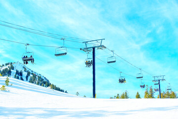 Skiers Using a Chairlift at Mammoth Ski Resort