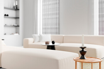 Coffee table with aroma candles, sofa with blanket on background. Simple scandinavian home decor. Hygge concept , 3d render