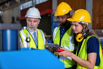 Plant manager visit engineer in factory at production line discuss on quality assurance improvement