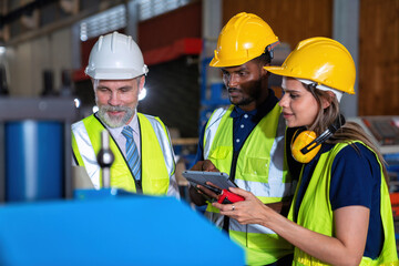 Plant manager visit engineer in factory at production line discuss on quality assurance improvement