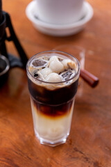 Black coffee with longan syrup and longan fruit