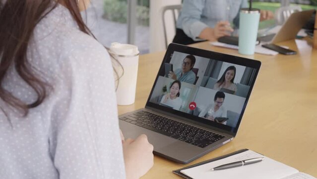 Young adult people asia woman work at hybrid workplace share office bored upset loss videocall anger annoy at low poor unreliable lost wifi router disconnect. Error bad slow speed signal outage issue.