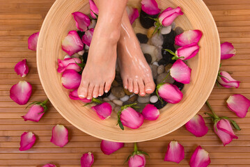 Being pampered by beautiful aromatic pink roses and therapeutic mineral water bath