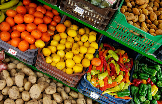 Image shows a fruit and vegetable market stand