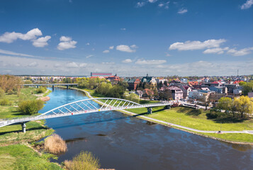 Cityscape of Wronki, Wielkopolska, Poland. Aerial summer view of the city on the bank of Warta river. - obrazy, fototapety, plakaty
