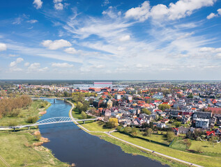 Cityscape of Wronki, Wielkopolska, Poland. Aerial summer view of the city on the bank of Warta river.