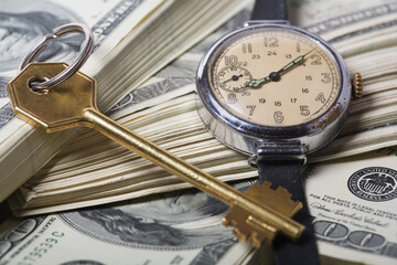 Conceptual keys to success of time and money. Rich colors and clear shot with skeleton key, US...